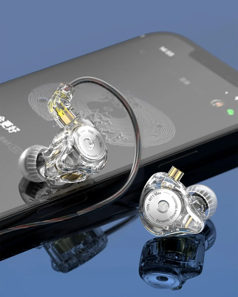 Clear white TRN MT1 MAX next to smartphone